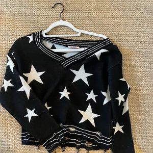 Black and white ripped star sweater